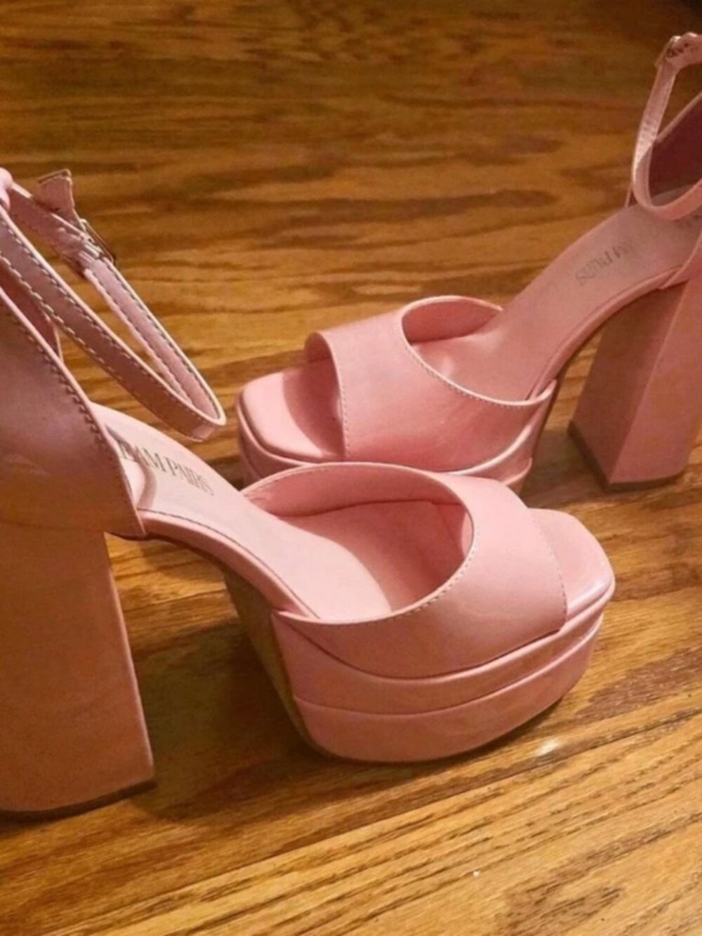 Pink platform heels in a US 9